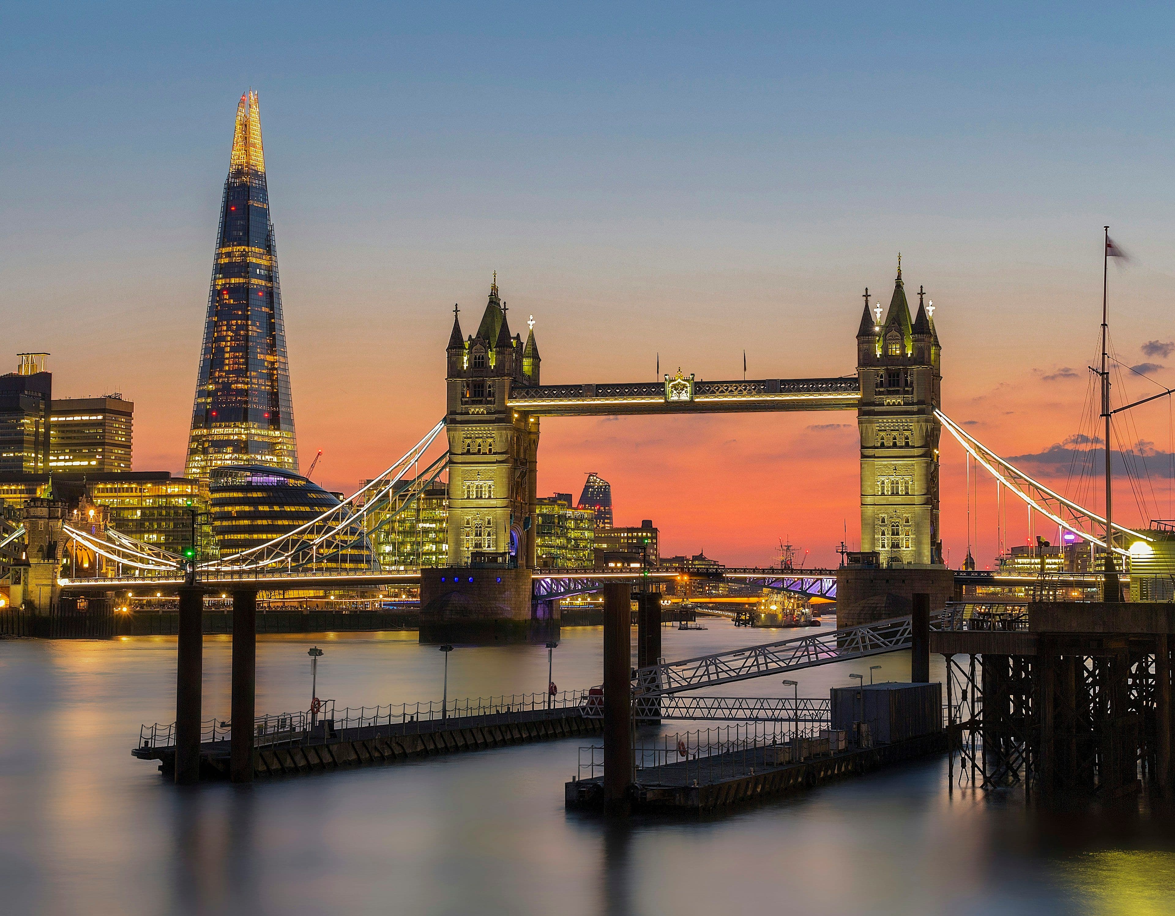 Tower Bridge and the Shard over the River Thames in London at sunset