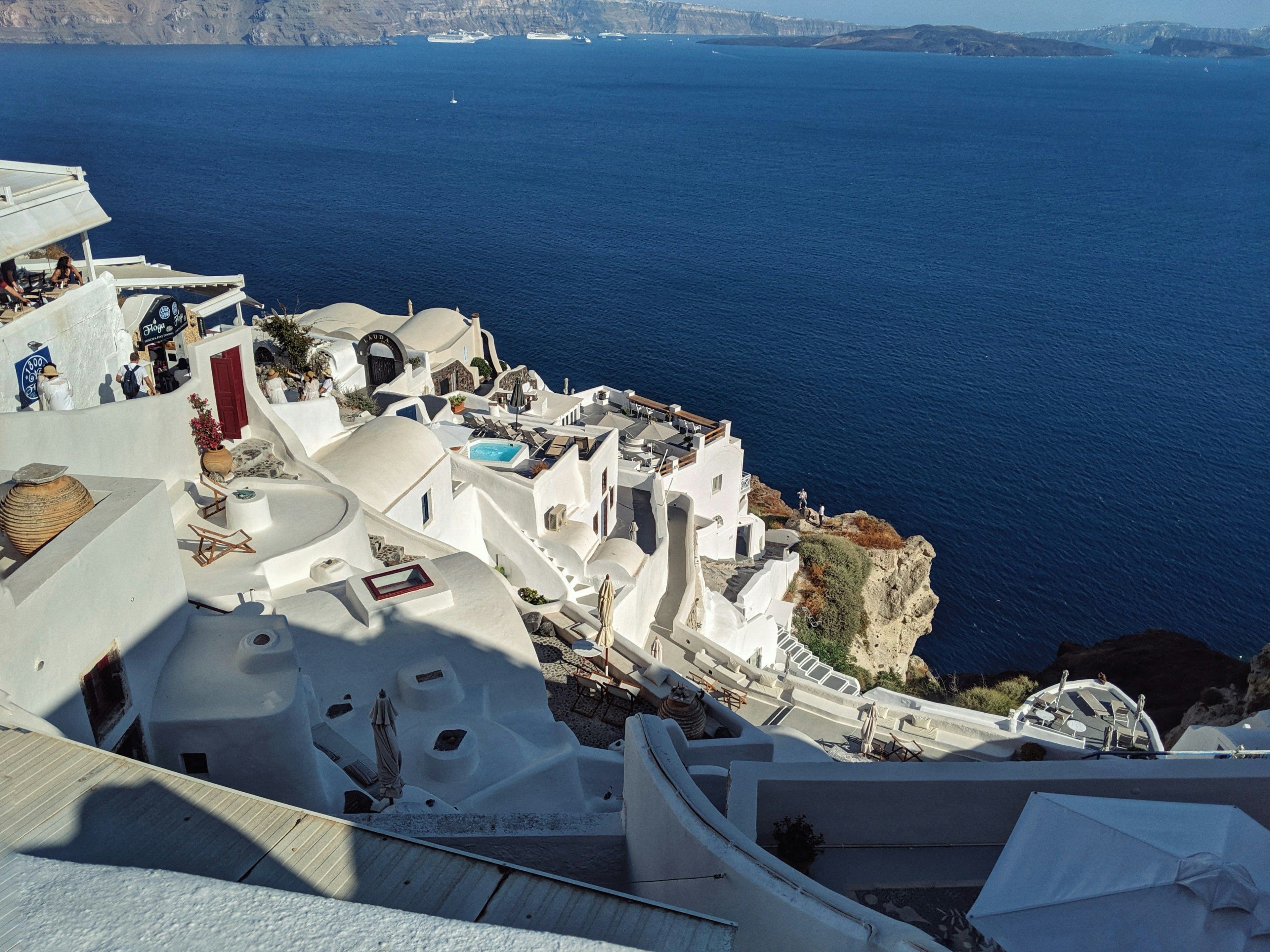 Whitewashed Towns and a Caldera Below
